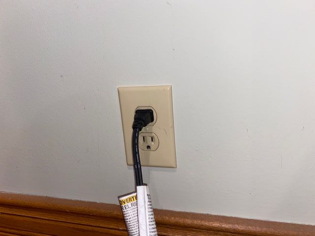 Electric outlet making a buzzing noise with cord plugged in