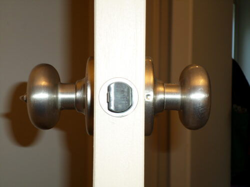 Side view of door with door knobs extending out